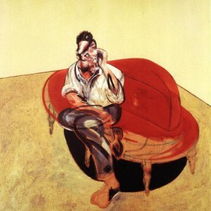 Portrait of Lucian Freud on orange couch